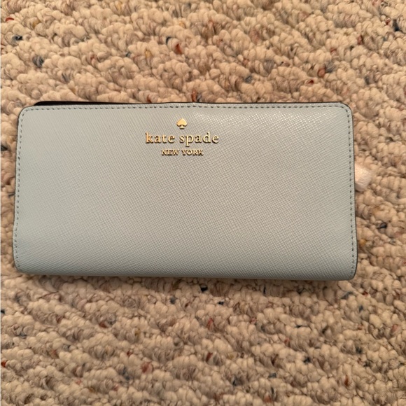 kate spade Handbags - NWT Kate Spade Madison Blue Glow Large Leather Bifold Wallet - style K1366